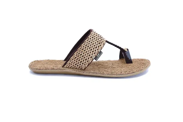 Toe-ring sandal with a coir footbed and woven strap