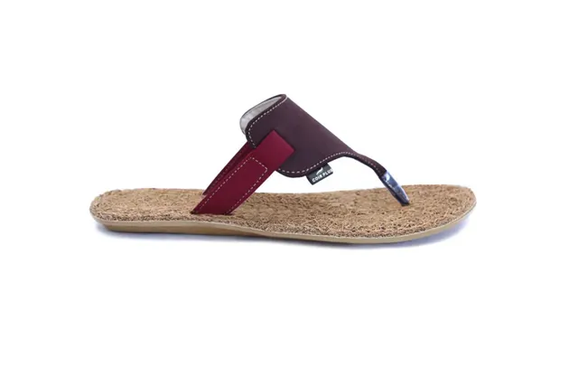 Flip-flop with a coir footbed and a purple strap